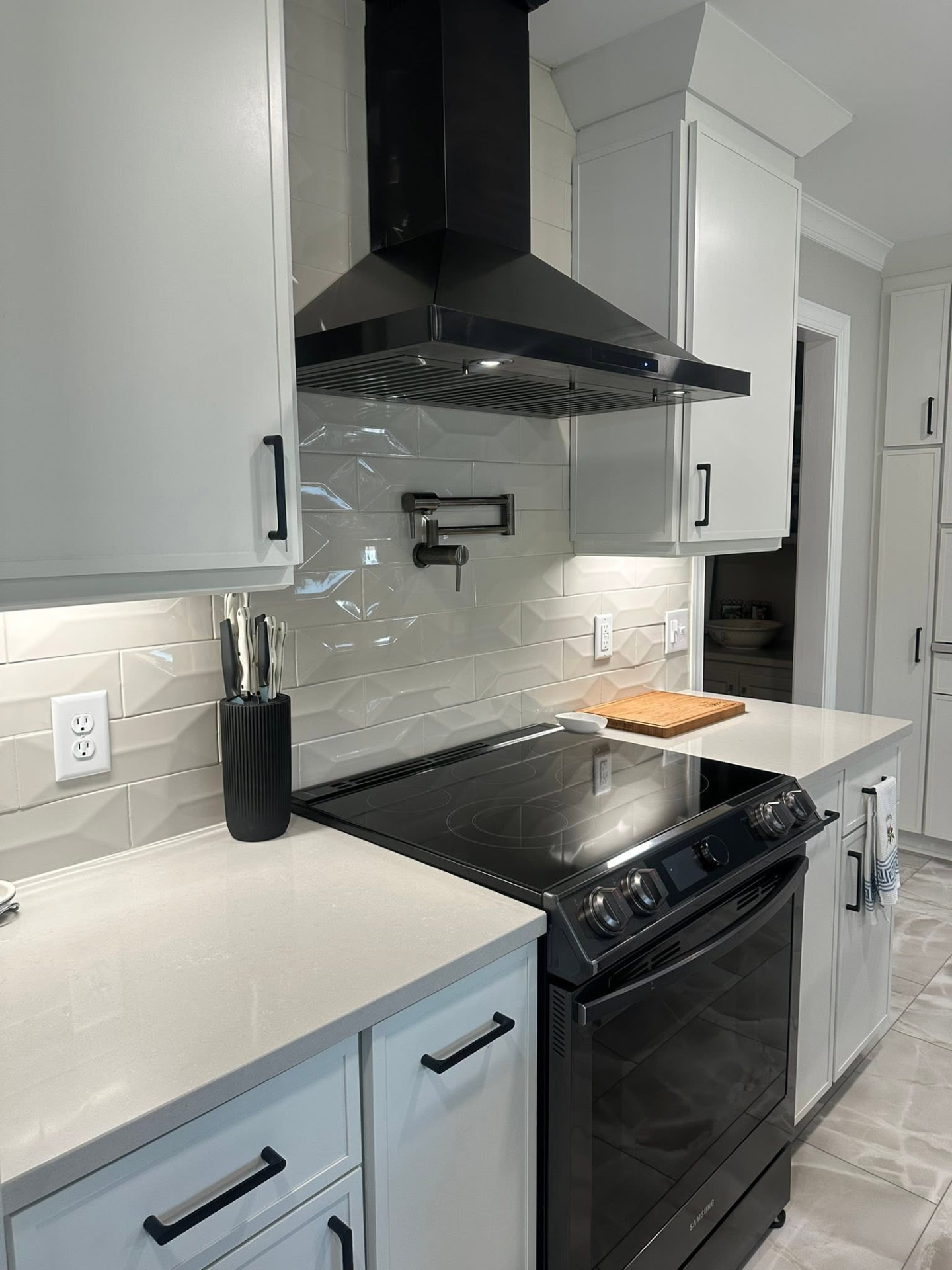 Spotless white kitchen with polished countertops
